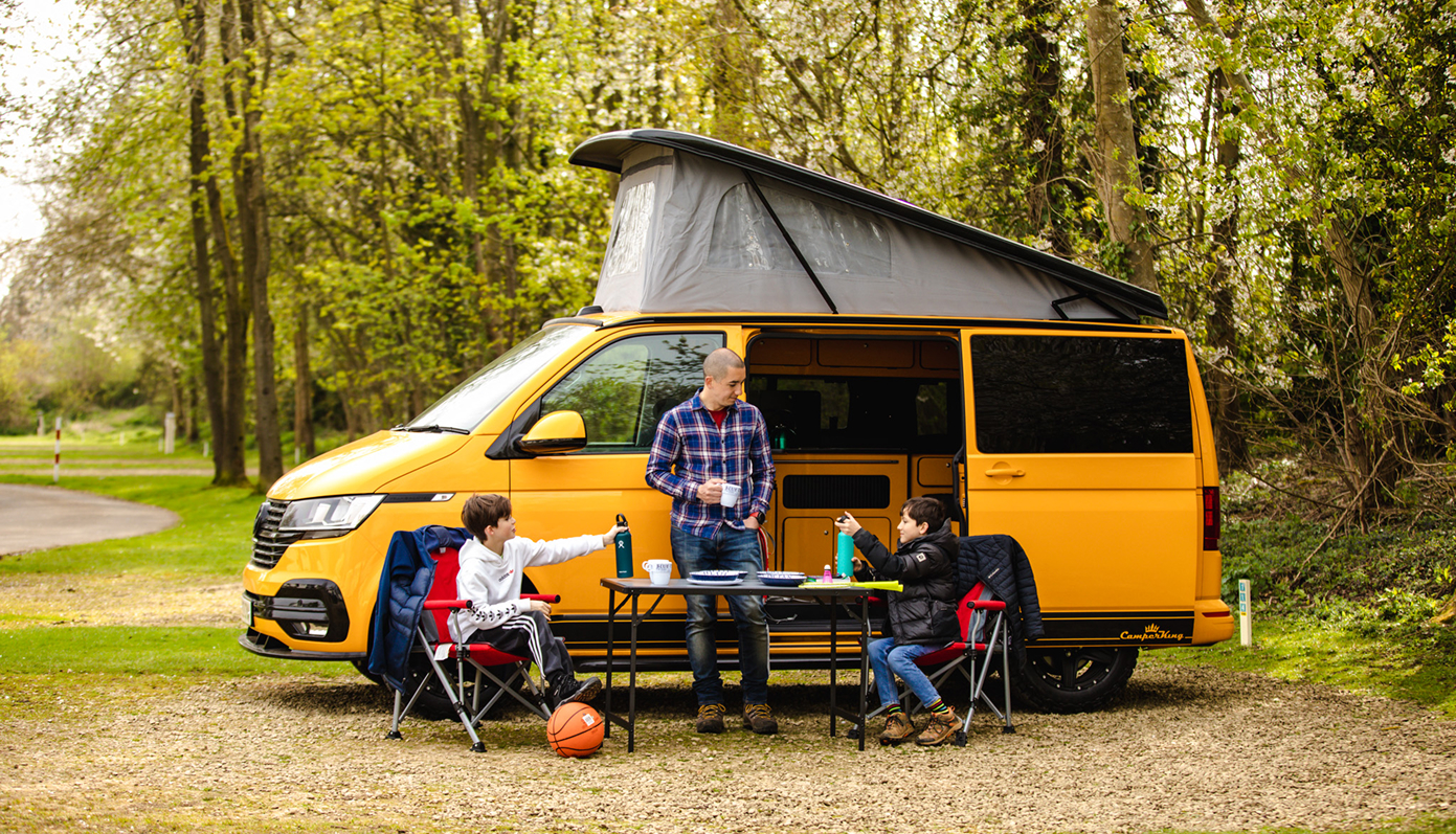 family using campervan