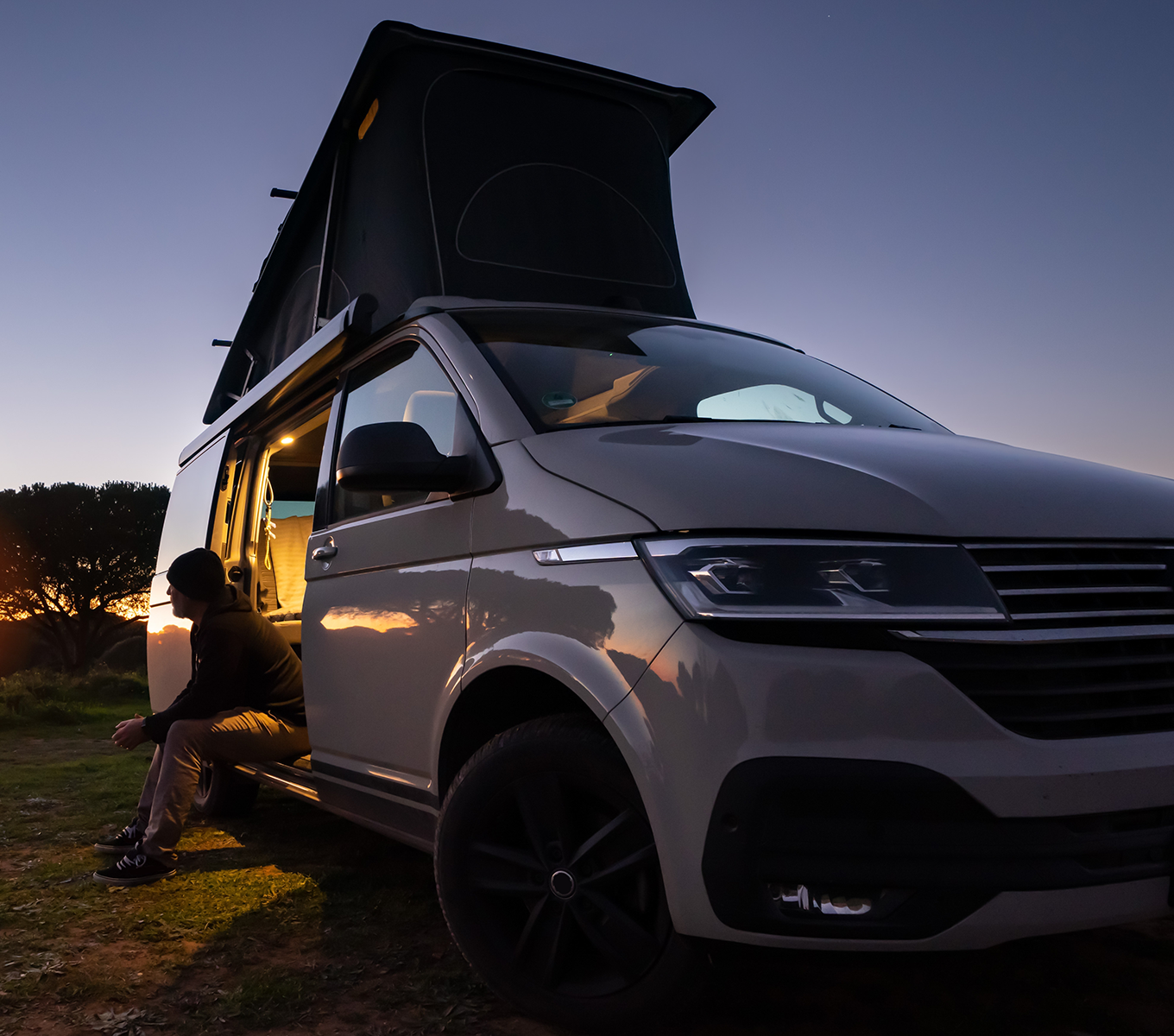 leaning out van at night