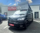 Black CamperKing campervan parked in front of CamperKing Scotland Showroom