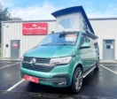 Bay Leaf Green Portofino CamperKing parked in front of CamperKing Scotland building in Falkirk