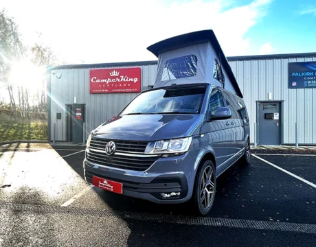 Pure Grey Highline LWB DSG CamperKing campervan parked in front of the CamperKing Scotland show room with the pop top roof up.